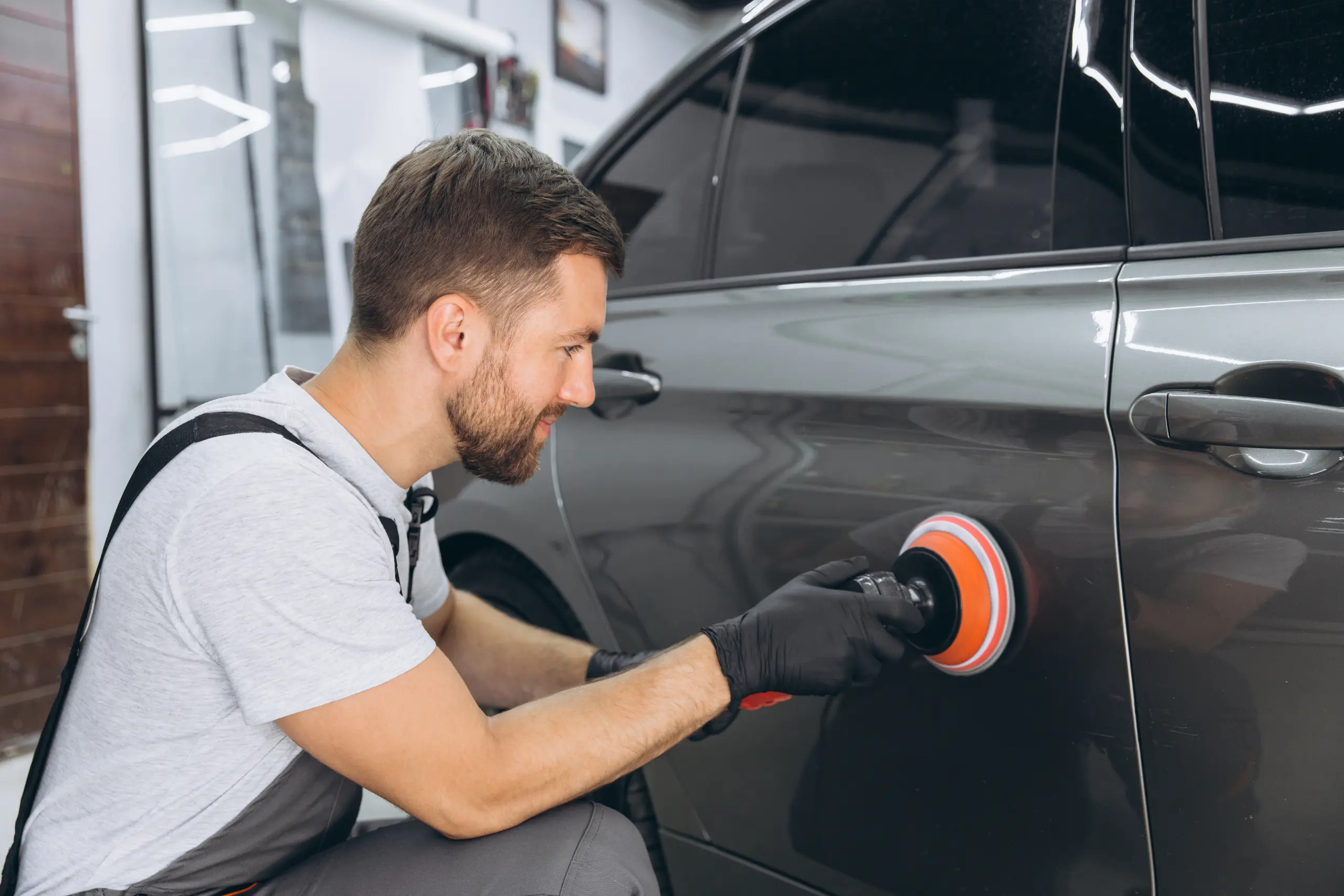 professional-car-detailing-with-an-auto-polisher