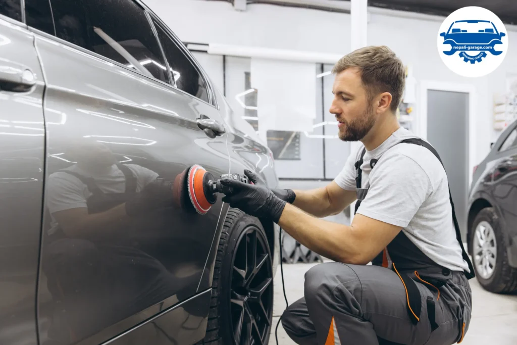 Car Body Polishing by mechanic in garage