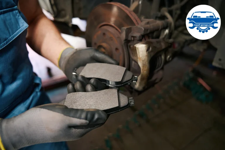 Mechanic changing car brake pads in garage